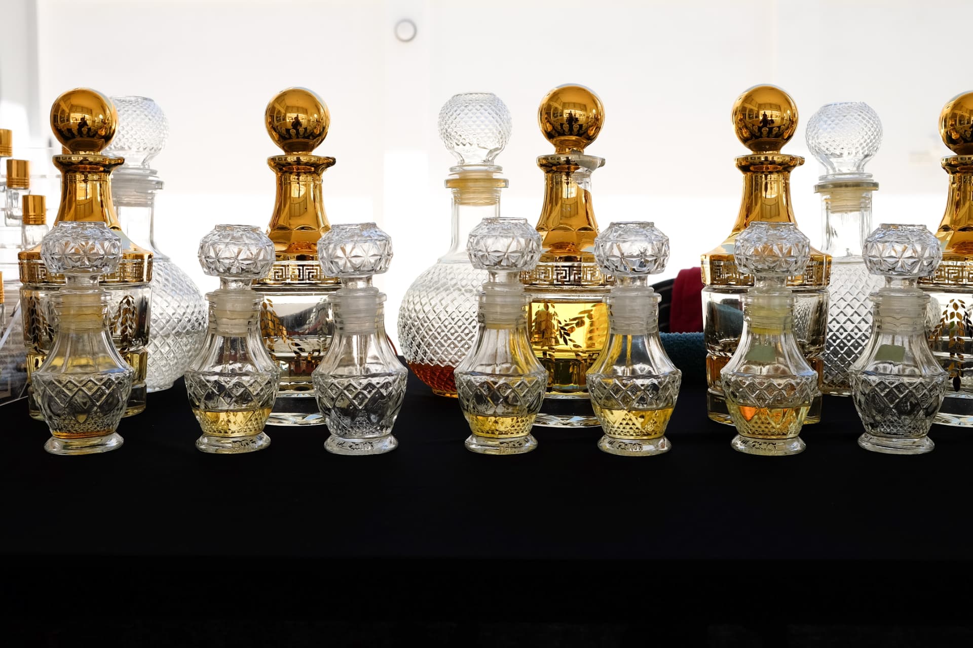 Crystal perfume oil bottles with gold stoppers